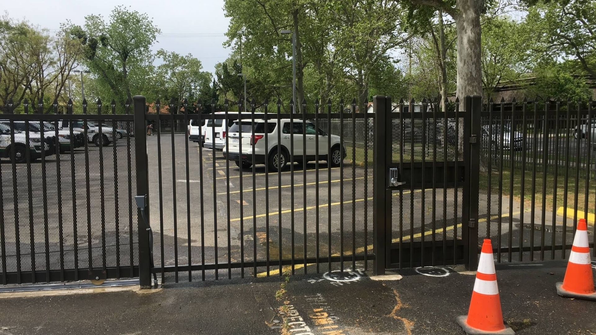 Automatic solar gate system and chain link perimeter fencing in Merced County California