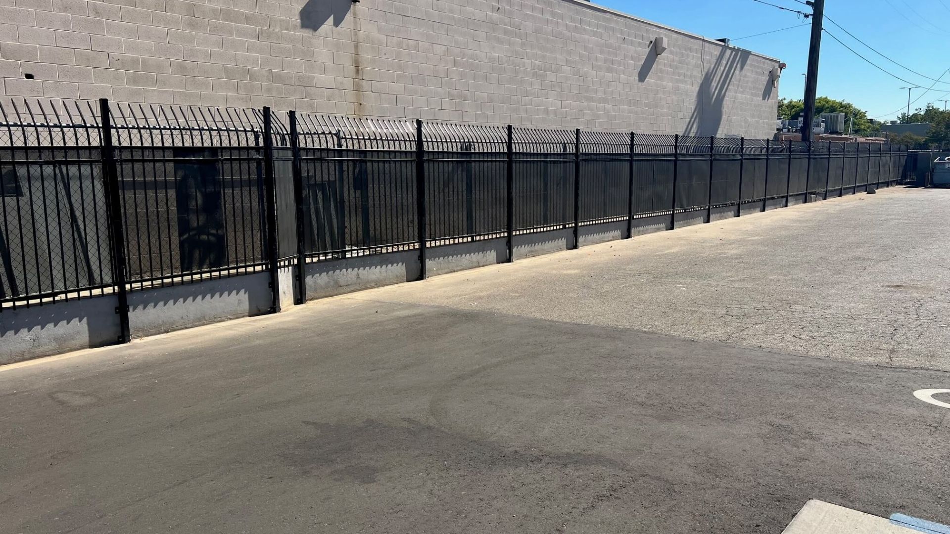 Long iron security fence installation at Hannah’s House in Modesto, California